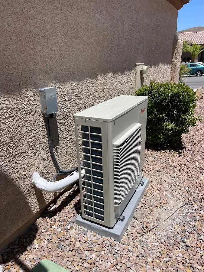 Residential air conditioning condenser unit in Sheridan